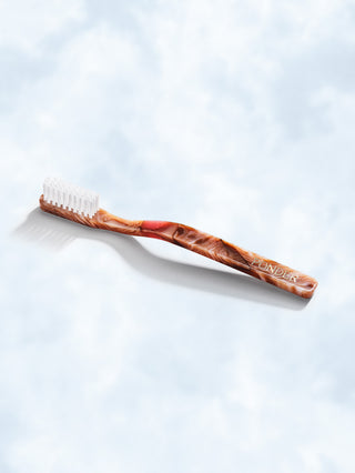 Medium hard nylon toothbrush · Pink
