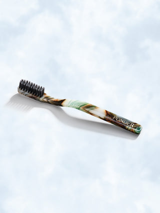 Soft charcoal toothbrush · Green