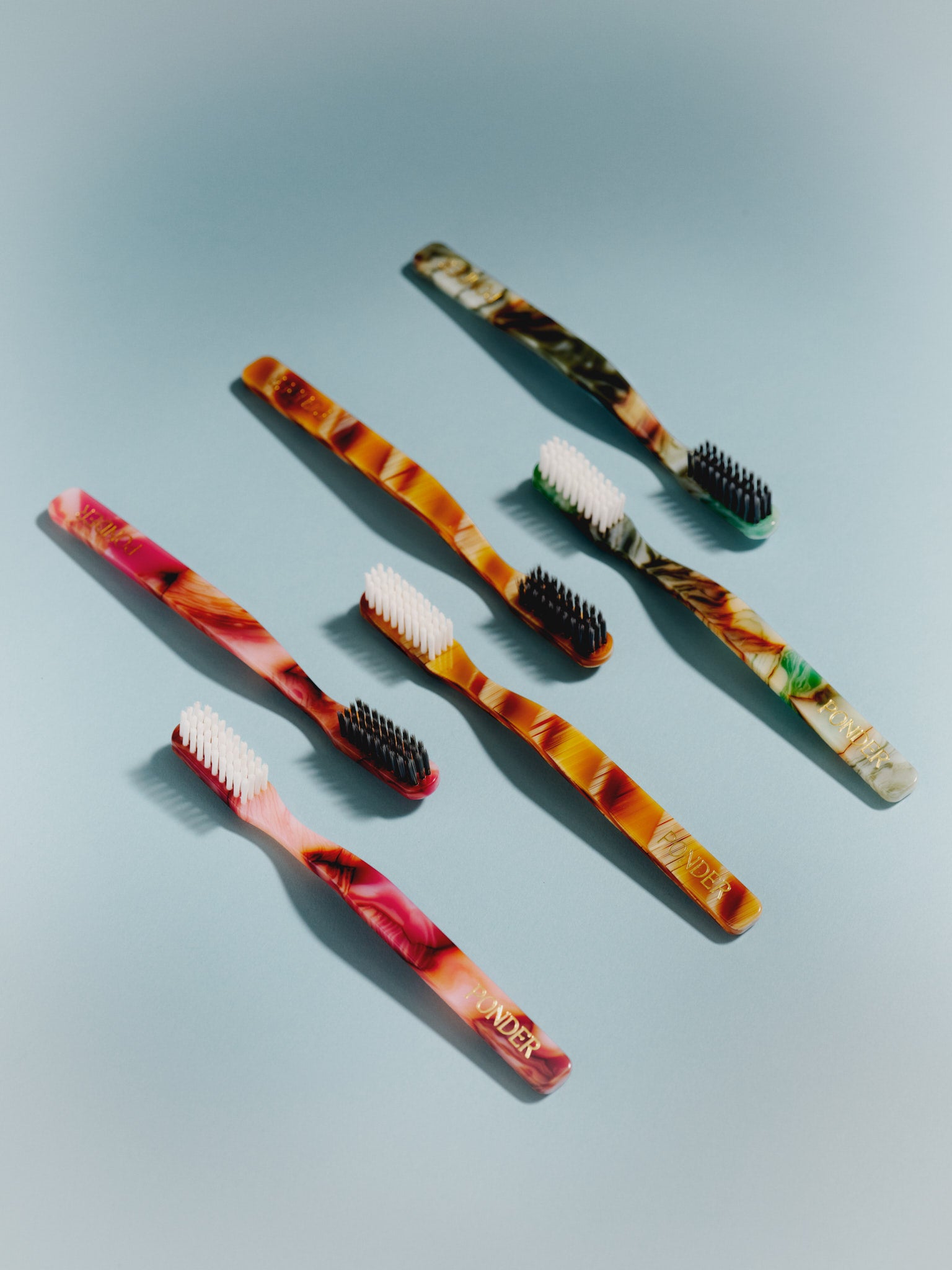 Medium hard nylon toothbrush · Green