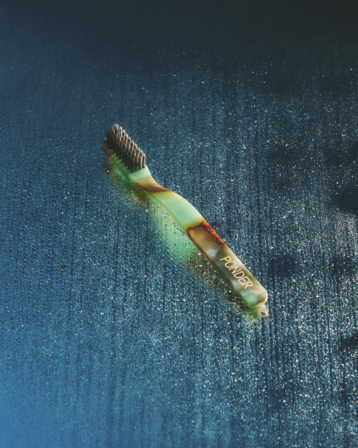 Soft charcoal toothbrush · Green