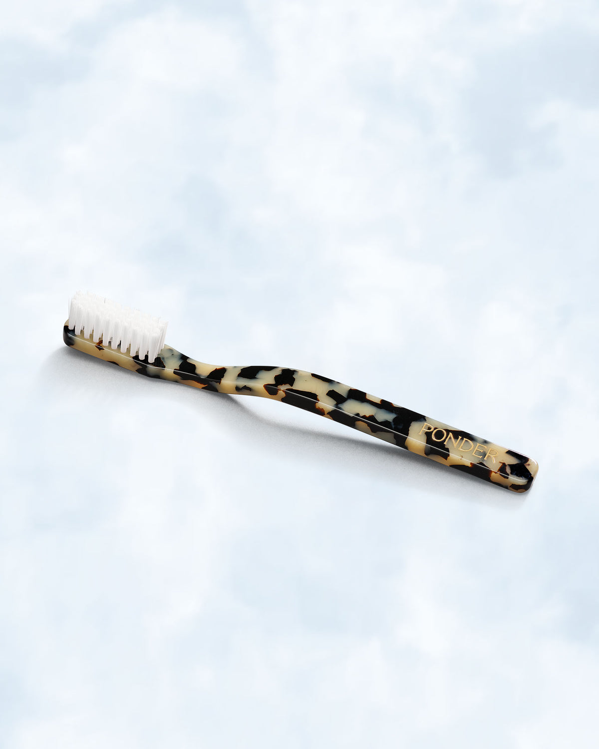 Medium hard nylon toothbrush · Black/White