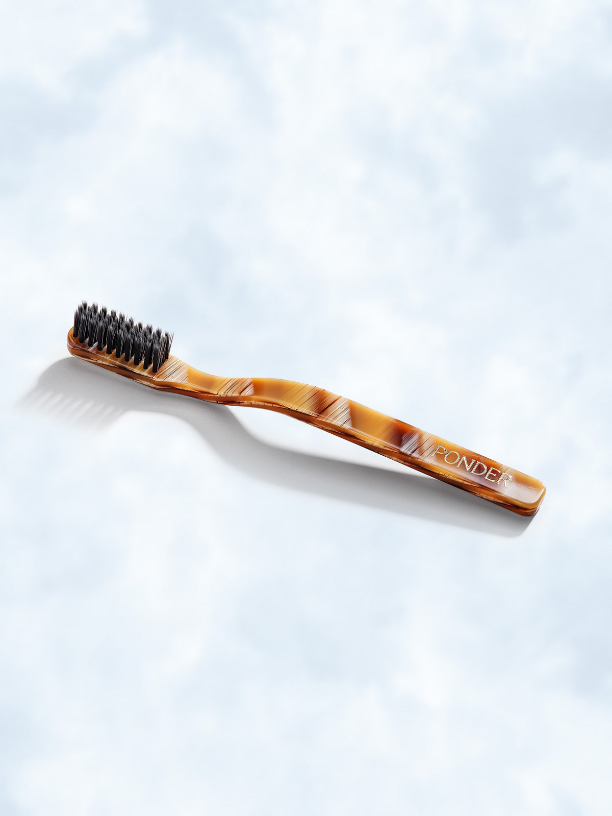Soft charcoal toothbrush · Brown